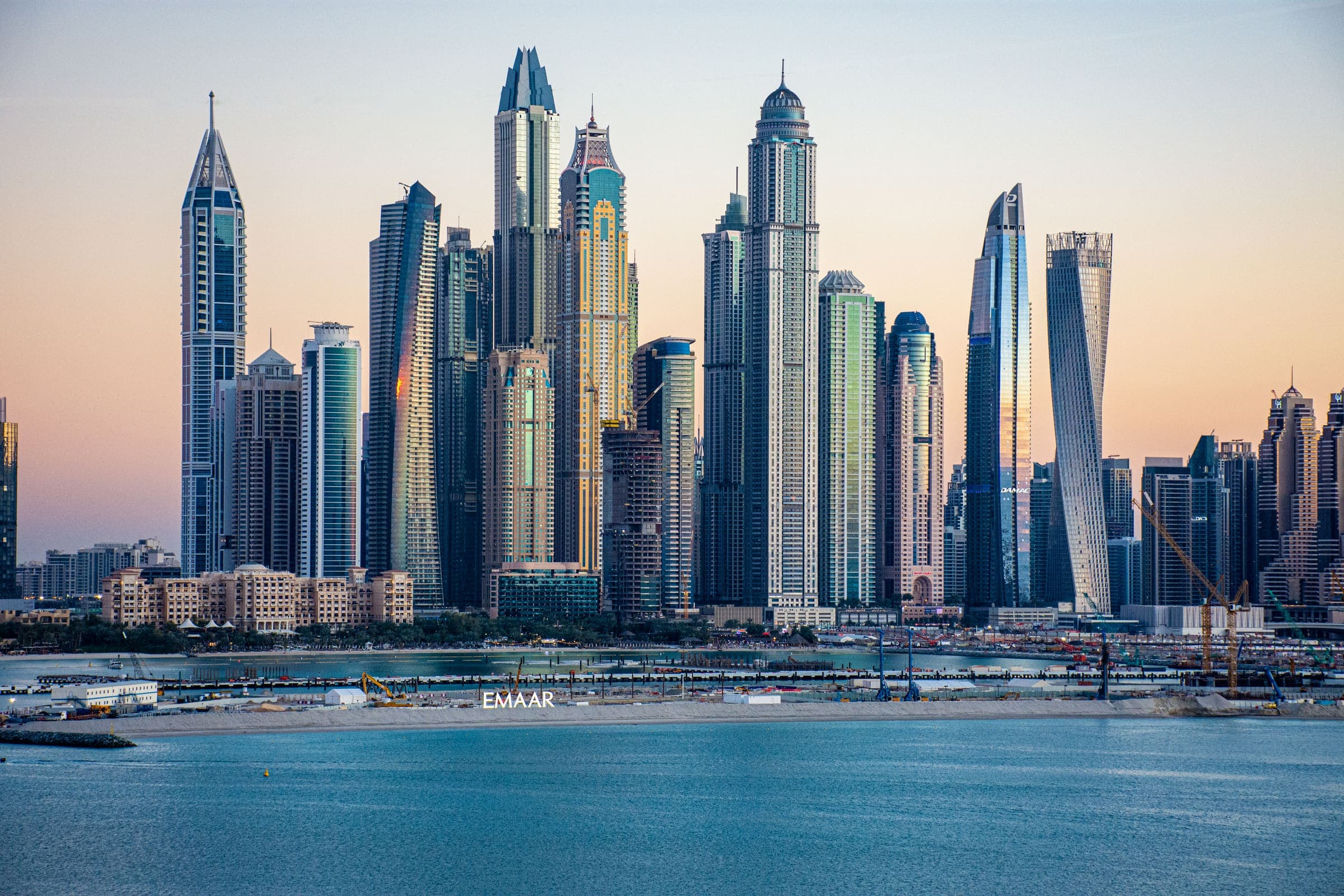 Dubai Marina skyline under a bright blue sky